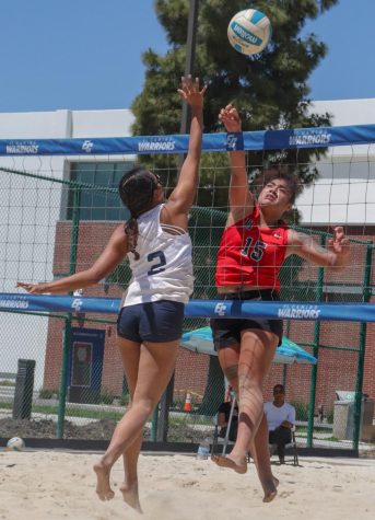 El Camino College's Francheska Aguilar fights for the ball during a match against College of the Desert's Joselyn Nunez and Paige Perez. Paired with Emily Uhrinak, Aguilar defeated Perez and Nunez in two sets (21-9, 21-9). (Kai Martinez | The Union)