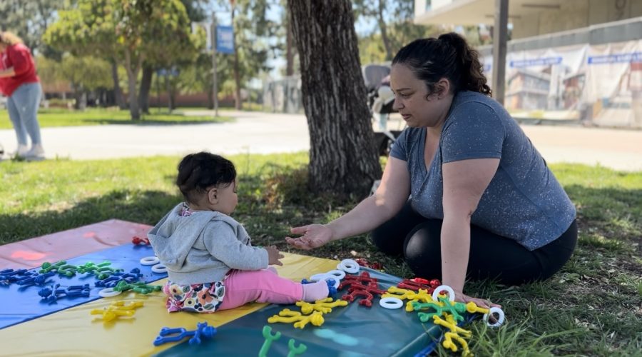 Morgan Weber, founder of the Child Development Club, plays with her 7-year-old during the You & Me Playgroup, on Saturday, April 1. The next You and Me Playgroup will take place on Saturday, May 6, from 11 a.m. to 12:30 p.m. in front of the Schauerman Library lawn. (Samantha Quinonez | The Union)