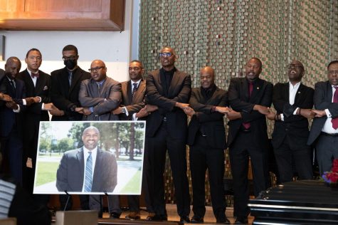 The first tribute speech during the April 11 Celebration of Life funeral service for Kenneth Brown hosted at Holman United Methodist Church ended with over 25 Morehouse College alumni taking the stage, including his son Kenneth Brown II who is standing third from the left. The Morehouse men linked arms and sang a somber rendition of “Dear Old Morehouse,” the college’s official hymn in honor of their fallen brother. Brown himself was a proud Morehouse graduate. ( Khoury Williams | The Union)