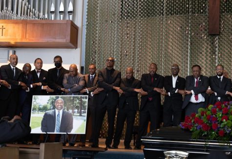 Over 25 Morehouse College alumni took the stage during the Celebration of Life funeral service held at Holman United Methodist Church on Tuesday, April 11. The Morehouse men linked arms and sang a somber rendition of “Dear Old Morehouse,” the colleges official hymn. Brown's eldest son (seen fourth from the right in a black face mask) joined his fellow graduates onstage as he is also a Morehouse graduate. Khoury Williams | The Union