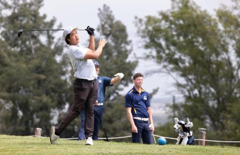 Braden Guerrero (middle) points at Chan Suk in recognition of his golfing skill at the beginning of hole 3 in the Orange Empire Conference Neutral match in Chino Hills on April 12. Suk was El Camino's best scorer during the event with 79. (Khoury Williams | The Union)