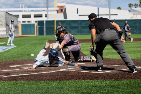 Warriors first baseman Ethan Felix slides into home base under a Mt. San Jacinto tag from catcher Gavin Copeland. Felix and Juan Carlos Camarena were brought into home by a single to left field by Elijah Tolsma in the bottom of the seventh inning. (Ethan Cohen | The Union)
