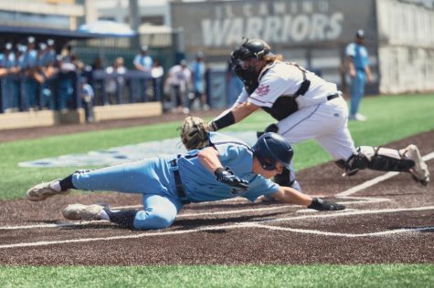 Warriors center fielder Elijah Tolsma beats the tag at home from Eagles catcher Gavin Copeland as he slides and touches the base. The Warriors beat the Eagles in Game 2 of the CCCAA SoCal Regionals on Saturday, May 6 at Warrior Field. (Ethan Cohen | The Union)