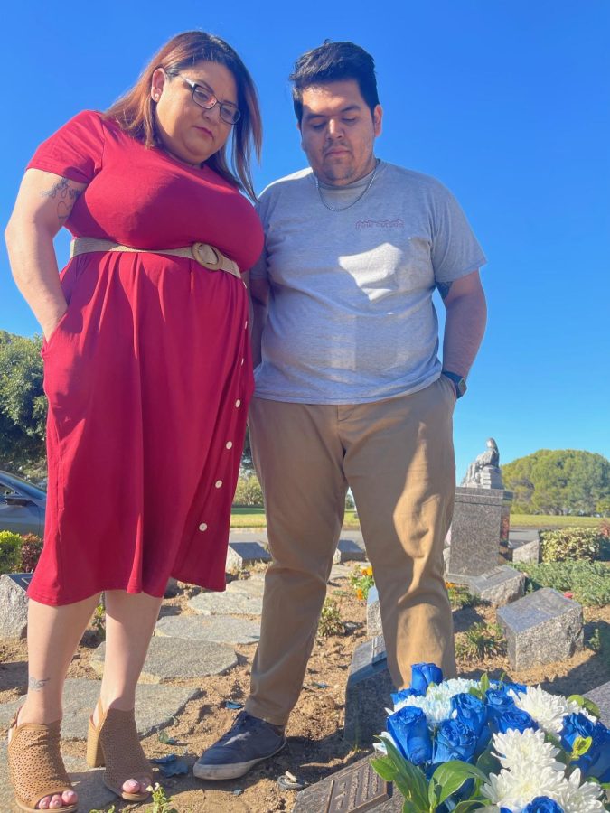 On Nov. 20, 2022, Yajaira Hernandez and her oldest son, Joseph Hernandez, visit the site where the remains of Juan Hernandez were laid to rest at Holy Cross Cemetery in Culver City, Calif. (Kim McGill | Warrior Life)