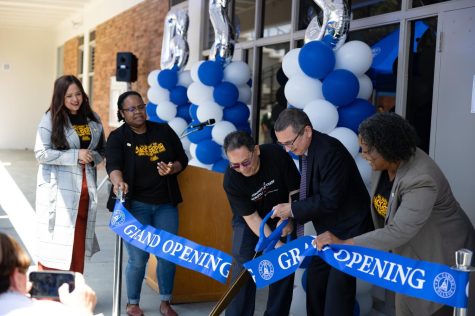Nayeli Oliva (left), Keiana Daniel, former Vice President of Student Services Ross Miyashiro, Trustee Nilo Michelin and President Brenda Thames stand together during the ribbon-cutting ceremony to mark the grand opening of the Black Student Success Center on April 26. (Khoury Williams | The Union)