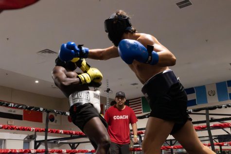 Lexx Brown (left) dodges a right hook from Thanos Sarreas during the main event match of the first inaugural Fight Night event presented by El Camino Colleges boxing club at the Sweet Science Boxing and MMA gym in Hawthorne on May 20. (Khoury Williams | The Union)
