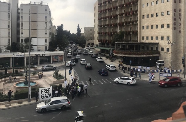 A protest occurs at Paris Square in Jerusalem outside of a roomates window on Nov. 19, 2019. The square is known for its many peaceful protests about the Israeli-Palestinian conflict. The right to protest in Israel is protected by the judiciary as a fundamental right. Photo courtesy of Ethan Cohen 