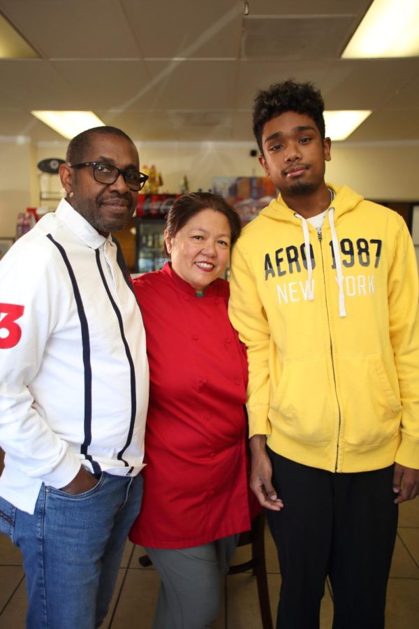 Sausalido Cafe owners Julius Obembe and Lucy Liampetchakul sometimes have help from their youngest son, 19-year-old Dylan Obembe, at the restaurant. Dylan Obembe is a student at West Los Angeles College. (Raphael Richardson | Warrior Life)