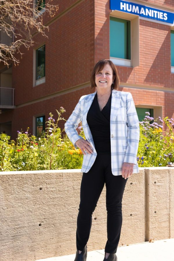 Humanities Dean Debra Breckheimer poses in front of the Humanities Building on March 27. Breckheimer will retire at the end of the spring semester. (Khoury Williams | Warrior Life)