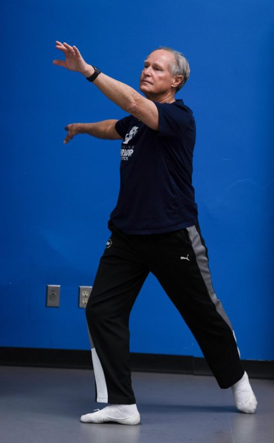 El Camino College Dance Professor Daniel Berney does a lunge arabesque in the dance room of the South Physical Education Building on April 19. Berney teaches beginning ballet, dance appreciation and history of dance of the 20th century. (Anthony Lipari | Warrior Life)