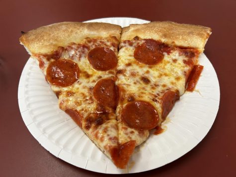 Two slices of pepperoni pizza at Pizza Machine, plus a drink, are available for $5.54. (Johan Van Wier | Warrior Life)