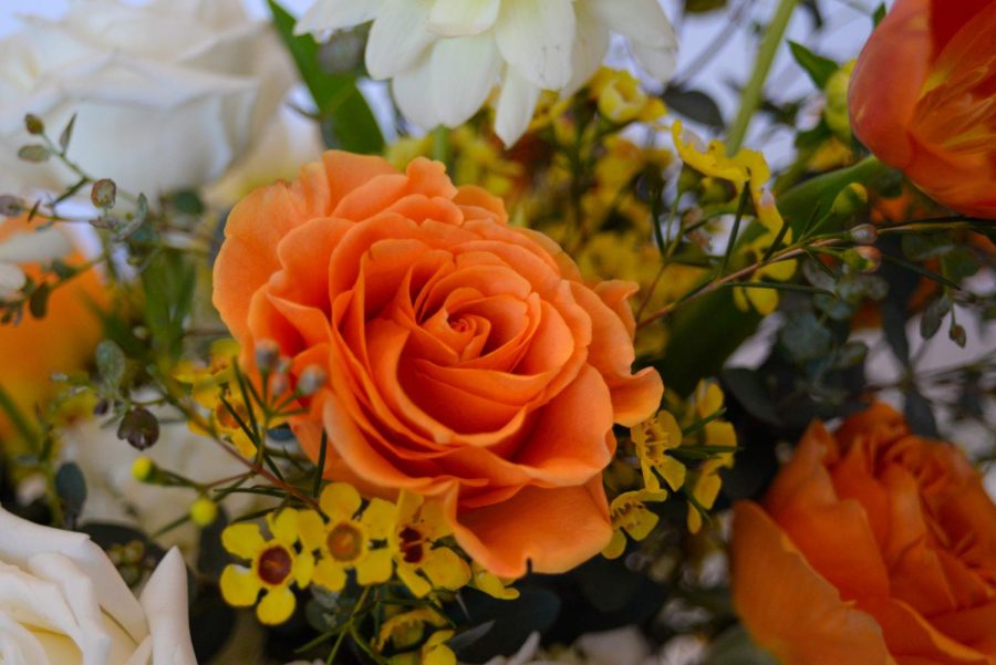 An+orange+and+white+rose+bouquet+with+yellow+flowers+is+displayed+at+Bloom+De+Fleurs+in+Torrance+on+April+20%2C+2023.+%28Ash+Hallas+%7C+Warrior+Life%29