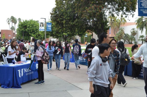 Students attend the Fall University Fair at the Library Lawn on Thursday, Sept. 21, 2023. (Juan Garcia | The Union)