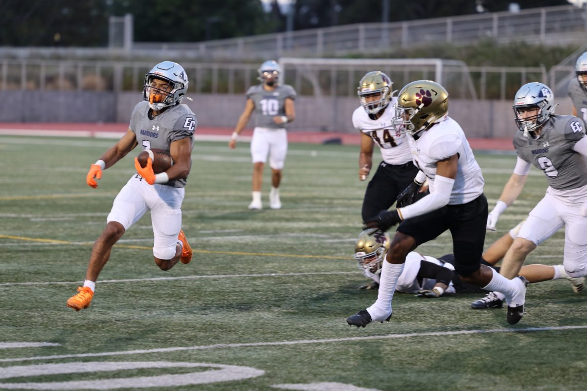 Following a complete pass, El Camino running back Marceese Yetts gains possession of the ball and paves through Southwestern for a later touchdown at 35-0 during El Caminos opening football game of the season on Sept. 2. (Saqib Rawda | The Union) 