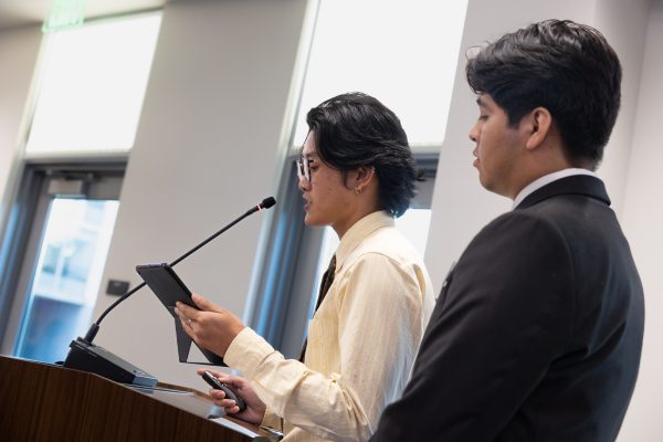 Associated Students Organization (ASO) Vice President Jeon Park (front) and President Jose Merino take to the podium at the Board of Trustees office to discuss the 2023-2024 budget, during the Sept. 6 meeting. The ASO leaders closed their presentation by showcasing a calendar of events for the current academic year. (Khoury Williams | The Union)