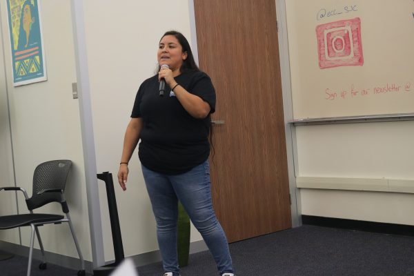 Outreach Specialist Isabel Gonzalez speaks to students in the Social Justice Center for the F.I.R.S.T orientation