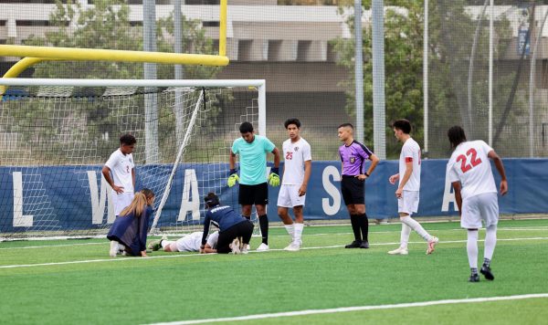 Our own crew showing the sportsmen ship on helping the team out in order to make sure all players are safe.(Bryan Sanchez | The Union)