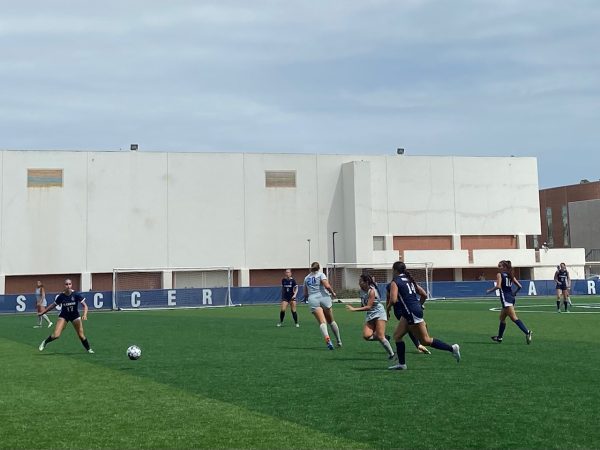 Ariana Ramirez, Warriors Defender, prepares to pass the ball to her teammates as the score is 2-2 and the Warriors are tied with the Corsairs.