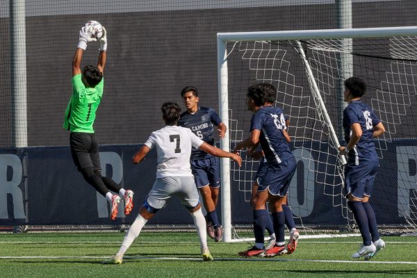 El Camino goalie Donovan Palomares catches a shot fired by Bakersfield players during a men's soccer game against Bakersfield College at El Camino on Tuesday, Sept. 26. At this point in the season El Camino was still ranked No. 2. (Bryan Sanchez | The Union)