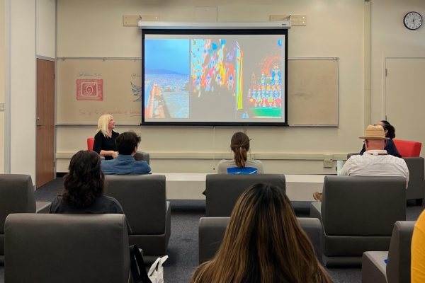 Students and guests listen to Alfa Karina Arrué as she talks about her journey to climb Mount Everest at the El Camino Social Justice Center on Thursday, Oct. 5. (Alondra Peza Camarena | The Union)