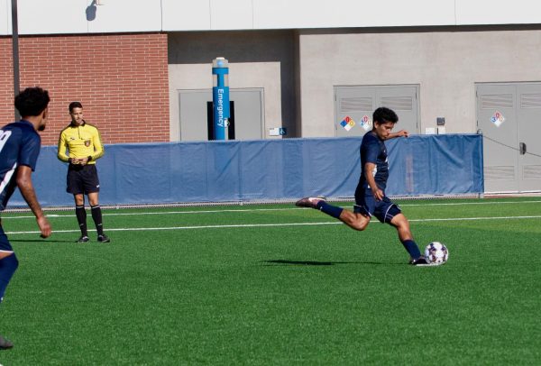 Juan Gomez, number 5, attempts a penalty kick during the Oct. 17 home game against Compton College. (The Union | Renzo Arnazzi)