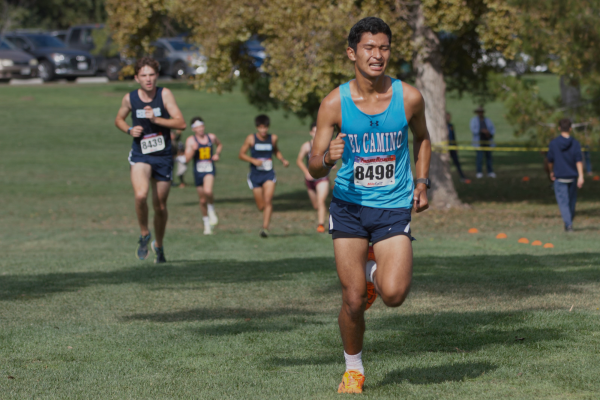 El Camino runner Luis Falcon Wong takes stride during the South Coast Conference Championships at Ken Malloy Regional Park in Harbor City on Friday, Oct. 27. (Renzo Arnazzi | The Union)