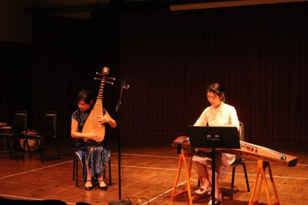 Yihan Chen (left) and Haowei Chang perform “Adavance of the E People” with traditional Chinese instruments pipa and guzheng during the First Annual World of Music Festival at the Haag Recital Hall on Thursday, Oct. 12. (Katie Volk | The Union)