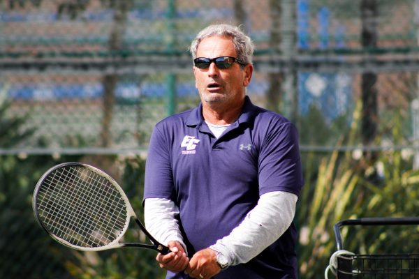 Sergiu Boerica, El Camino College tennis coach, serves the ball during his class at the ECC Tennis Courts on Wednesday, Sept. 27. (Monroe Morrow | The Union)