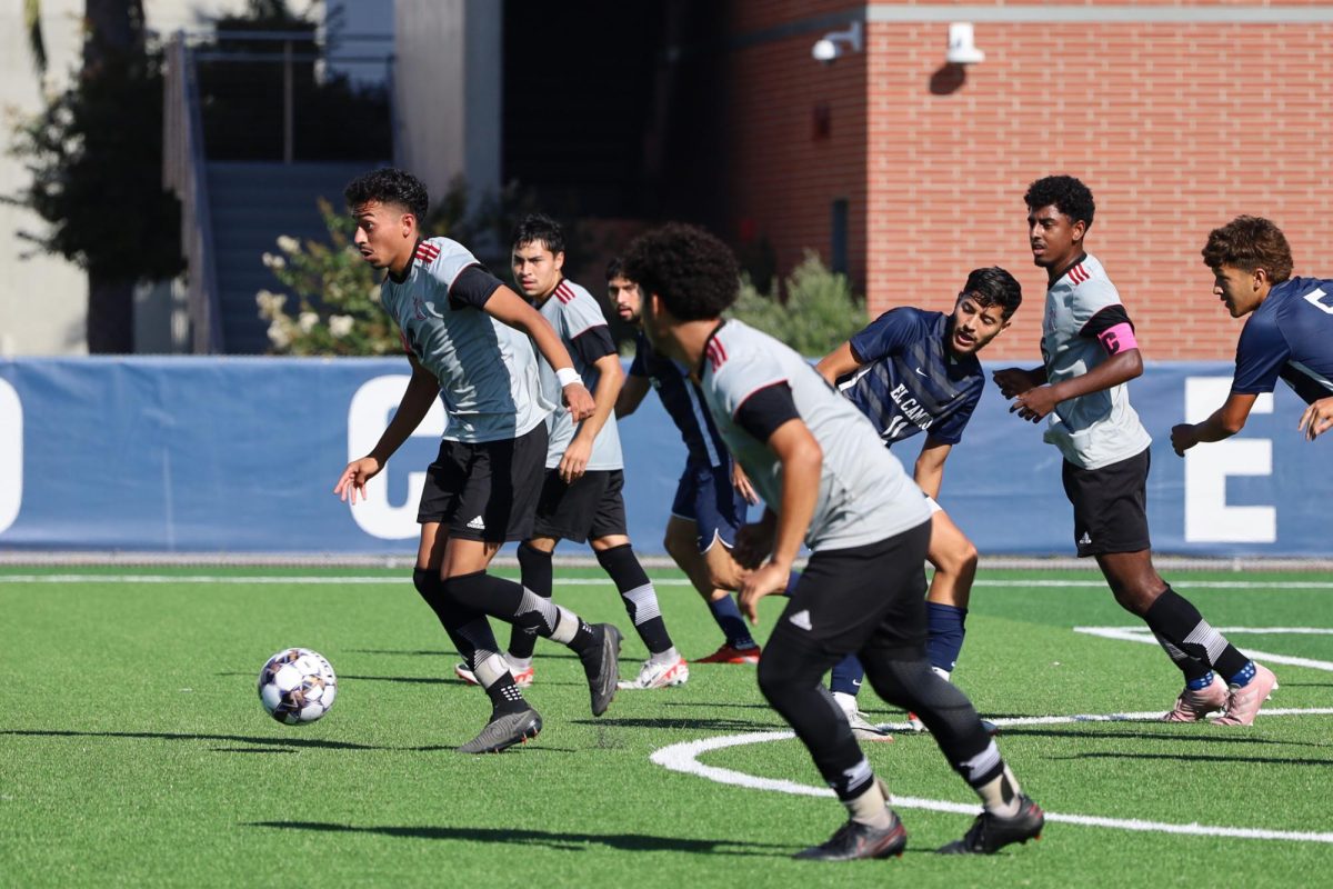 El Camino College and Compton College soccer players scramble for the ball during the mens match at the ECC Soccer Field on Tuesday, Oct. 17. (Ma. Gisela Ordenes | The Union)