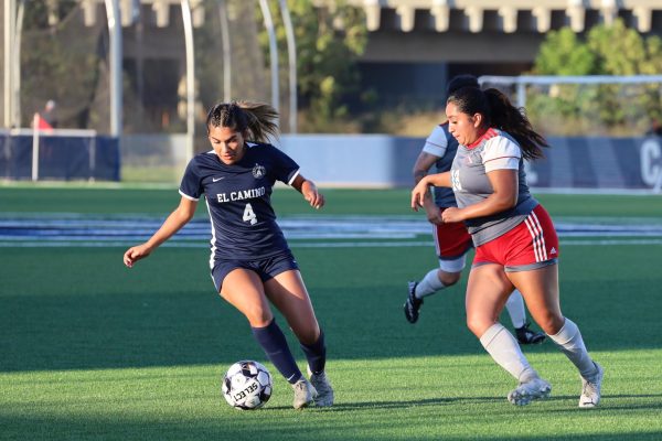 El Camino College midfielder Ruby Colcol runs with the ball as Compton College defender Joseline Rivera runs after it during the El Camino College vs Compton College match at the ECC Soccer Field on Tuesday, Oct. 17. (Ma. Gisela Ordenes | The Union)