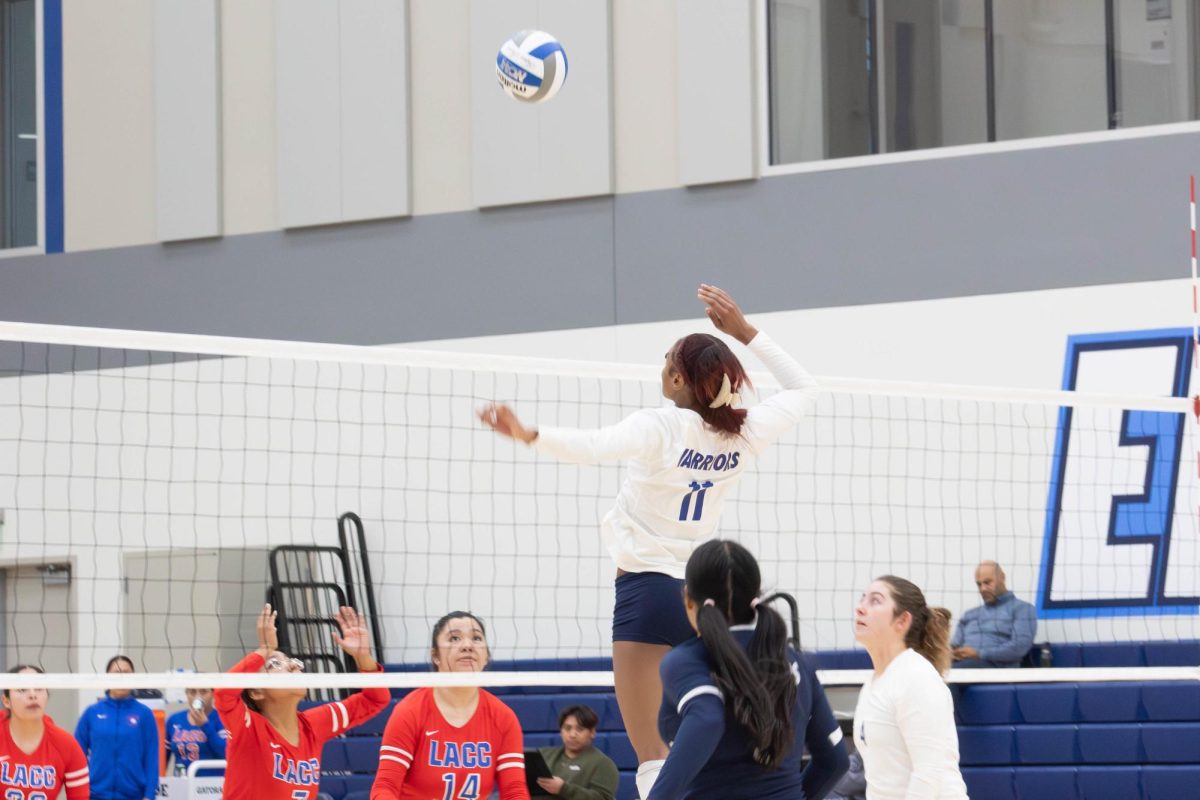 Aireon Scott (11) used her height to her advantage to attack from a high position during the Oct. 4 home game against Los Angeles City College. (Misaki Asaba | The Union)