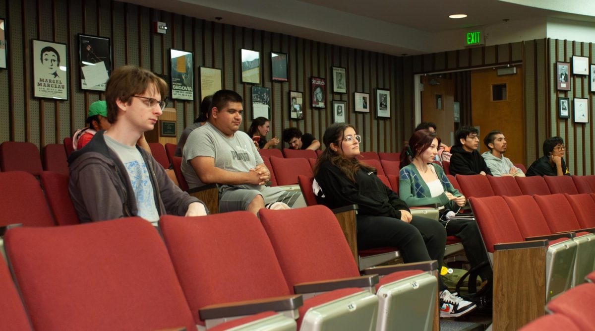 Students attend a meeting of the Scene One Film Club in the Haag Recital Hall  on Tuesday, Sept. 26. (Osvin Suazo | The Union)