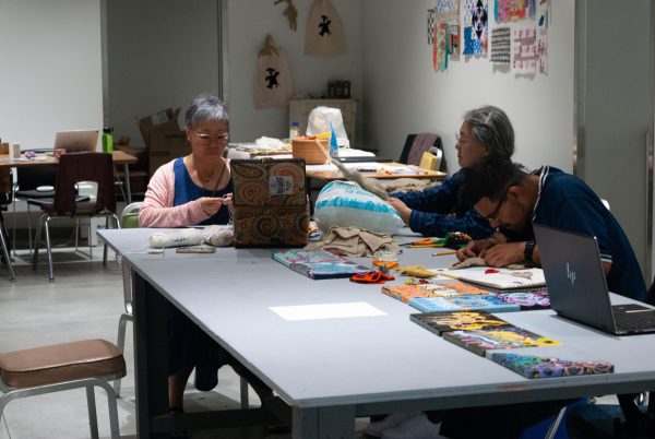 The results of workshops, hosted by the El Camino Art Gallery, can be seen along the workspace walls. Students use available materials to learn sewing, crochet, and embroidery.