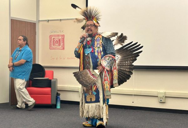 Tso Yanez speaks to the audience about his Native American history and background at the Social Justice Center on Wednesday, Nov 15. (Nick Geltz | The Union)