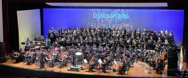 Grammy winner Christopher Tin conducts both the Inner City Youth Orchestra of Los Angeles and the Angel Chorale in performing Njooni Waaminifu at the Marsee Auditorium on Sunday, Nov. 19. (Joshua Flores | The Union)