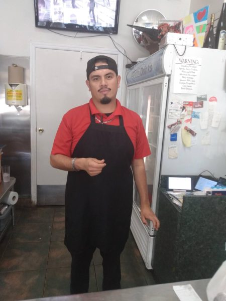 Former Pupusa Town employee Oscar Hernandez now working at a different restaurant in Wilmington. date taken Nov. 4