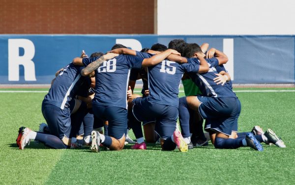 The El Camino College mens soccer team huddles up for a pep talk in preparation for the game during an Oct. 17 match against Compton College. On Friday, Dec. 1. The team won the California Community College Athletic Association state championship semifinals game after defeating Evergreen Valley College 4-0. (Renzo Arnazzi | The Union)