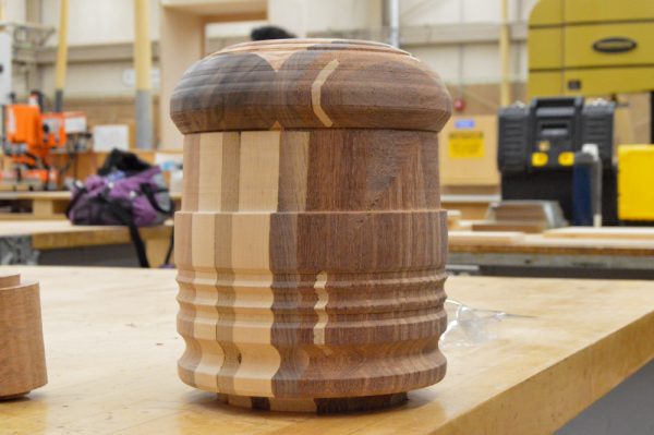 A lidded container in progress with the top still needing to be sliced off is displayed inside the El Camino woodworking workshop on Wednesday, Nov. 29. This project was made by El Camino woodworking student Daniela Romero. (Juan Garcia | The Union)