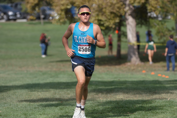 El Camino runner Kai Hajir takes stride during the South Coast Conference Championships at Ken Malloy Harbor Regional Park in Harbor City on Friday, Oct. 27. (Renzo Arnazzi | The Union)
