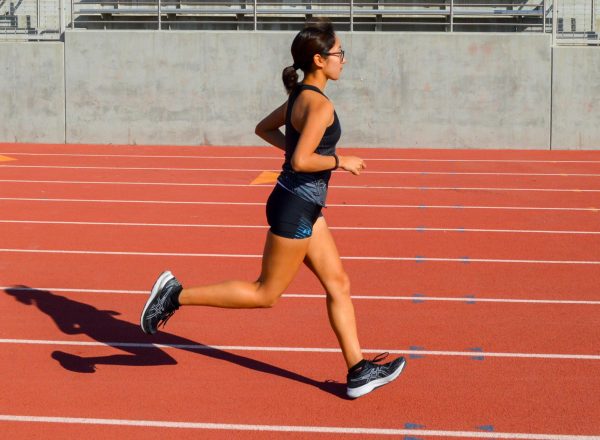 Sequoia Gonzales running down the track showing us what she loves to do on Dec 11 on .(Caleb Smith|The Union)