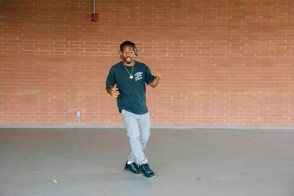 Rayshawn Reed dances hip-hop on the floor above the El Camino College Bookstore on Wednesday, Nov. 15. (Osvin Suazo | The Union)