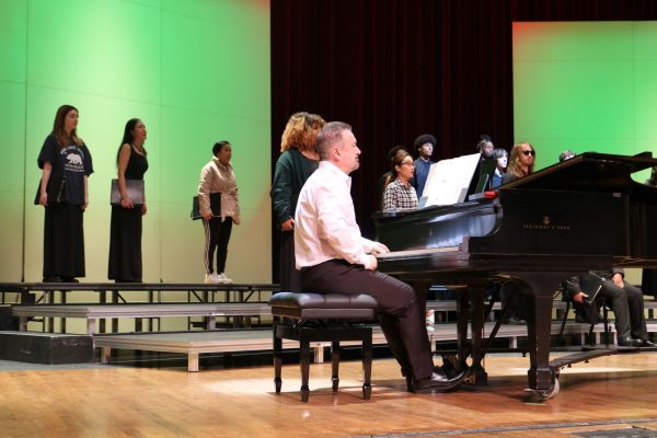 Pianist Kenner Bailey rehearses with Concert Choir before the ECC Chorale, Concert Choir and Women's Chorus performance at the Marsee Auditorium on Friday, Dec. 1. (Joseph Ramirez | The Union)