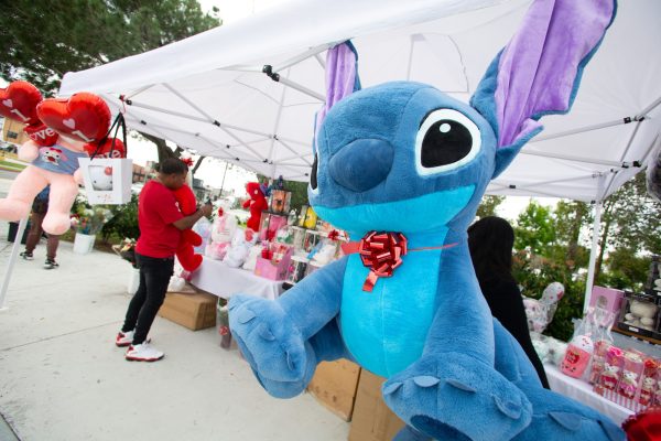 A giant Stitch plush hangs ready to be bought as a gift from a Valentines Day stall across the street from El Camino College, on Wednesday, Feb. 14. (Raphael Richardson | The Union)