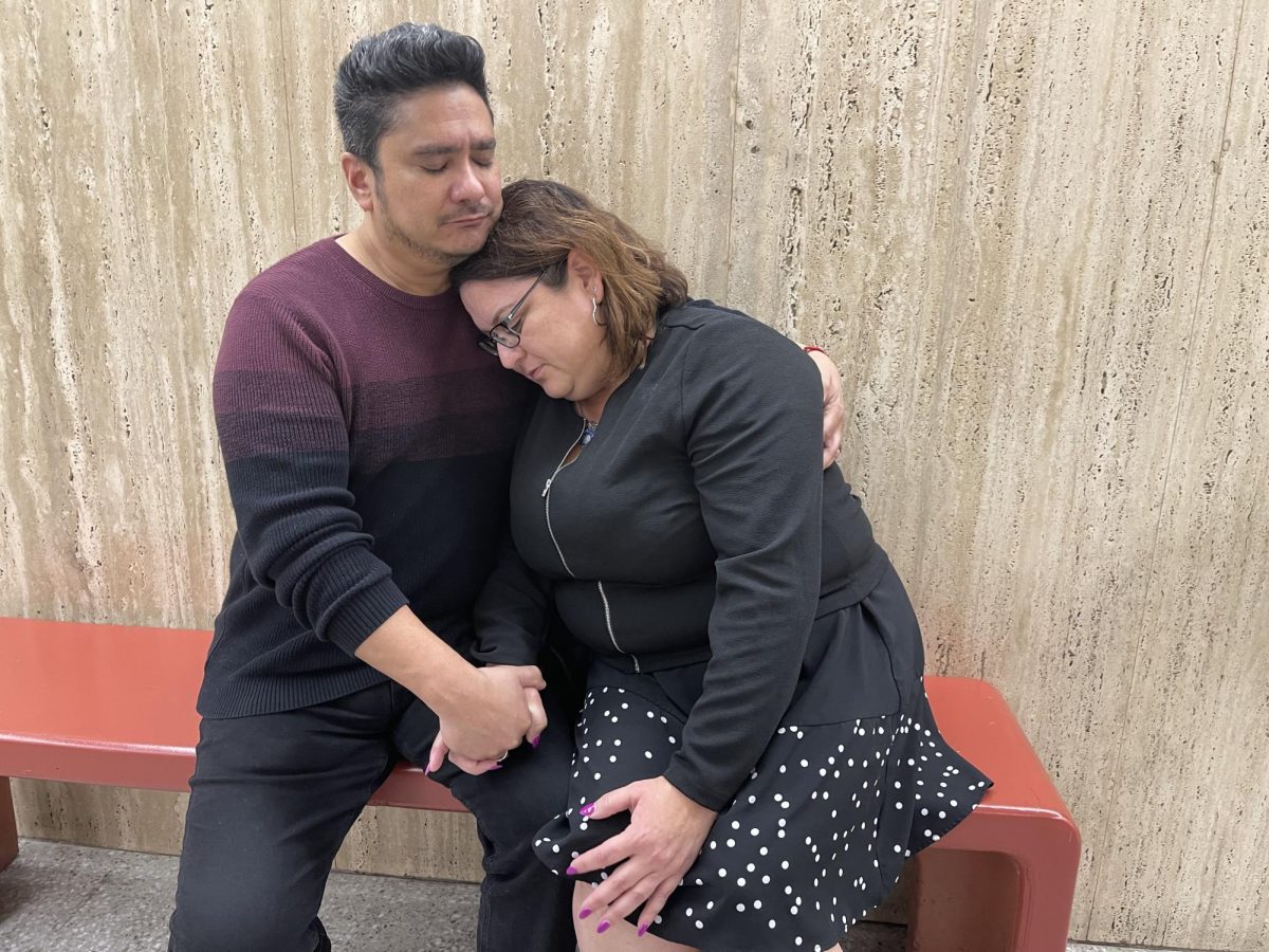 Yajaira Hernandez and her partner Joel Wright wait outside Department 117 on the 11th floor of Clara Shortridge Foltz Criminal Justice Center in Downtown Los Angeles during a break in closing arguments on Friday, Feb. 23, 2024. On Monday, Feb. 26, jurors found Weijia Peng, 34, of Alhambra and Ethan Astaphan, 30, of San Gabriel guilty of first-degree murder in the killing of Hernandezs son, El Camino College student Juan Hernandez. Sentencing is scheduled for Thursday, April 25. Los Angeles County Assistant District Attorney Habib Balian called Peng’s and Astaphan’s actions, “cold, deliberate, calculated, vicious. (Kim McGill | The Union)
