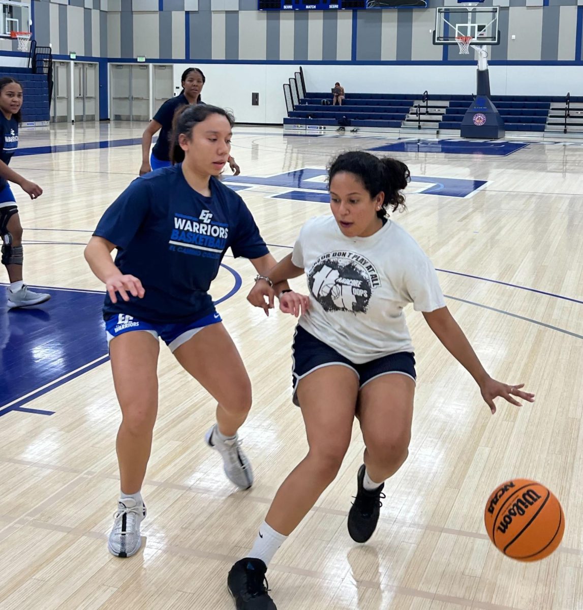 Warriors guard Teena Ponce, left, defends the paint during the team's practice at the ECC Gym Complex on Thursday, Feb. 28. This was Ponce's last year at El Camino College. She made the 2022-23 All SCC team the previous year. (Tommy Kallman | The Union)