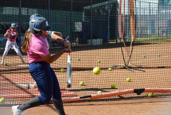 An El Camino softball player takes a crack at the ball during practice on Feb. 28 at 1:30 p.m. (Caleb Smith | The Union)