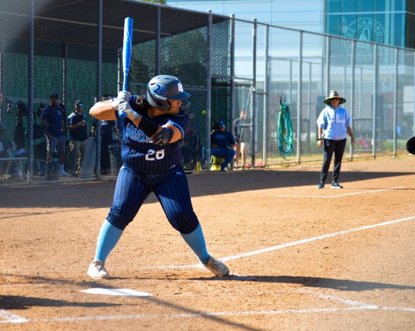 El Camino College catcher Julianna Vasquez waits for the pitch in the Warriors' game against the Panthers at the ECC Softball Field on Wednesday, March 20 . (Caleb Smith | The Union)