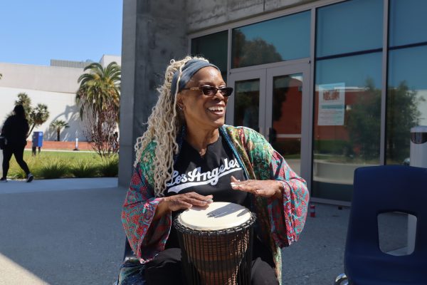 "The Storyteller" Sharon Sanders beats her drum to honor Native American ancestors and welcome the spring equinox during the Native American Drum Circle at El Camino College on Tuesday, March 19. (Jamila Zaki | The Union)