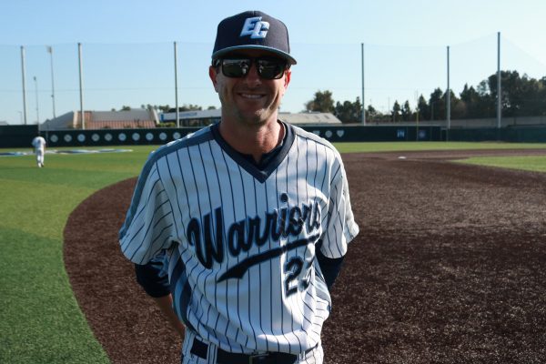El Camino College Baseball coach Grant Palmer poses for a picture after the Warriors' dominant 6-2 win over the Long Beach City College Vikings on Tuesday, March 19. This is Palmer's first season with the team. He has started with an 11-13 record. (Joseph Ramirez | The Union)