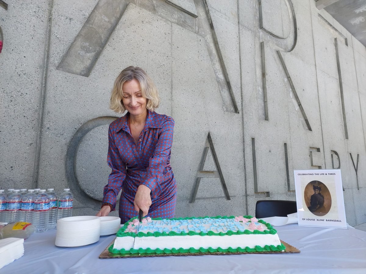 Kate+Devine-Brady%2C+great-granddaughter+of+Aline+Barnsdall%2C+makes+the+first+slice+into+the+birthday+cake+honoring+her+great-grandmother%E2%80%99s+legacy+at+the+El+Camino+College+Art+Gallery+on+Thursday%2C+March+28.+%28Nikki+Yunker+%7C+The+Union%29